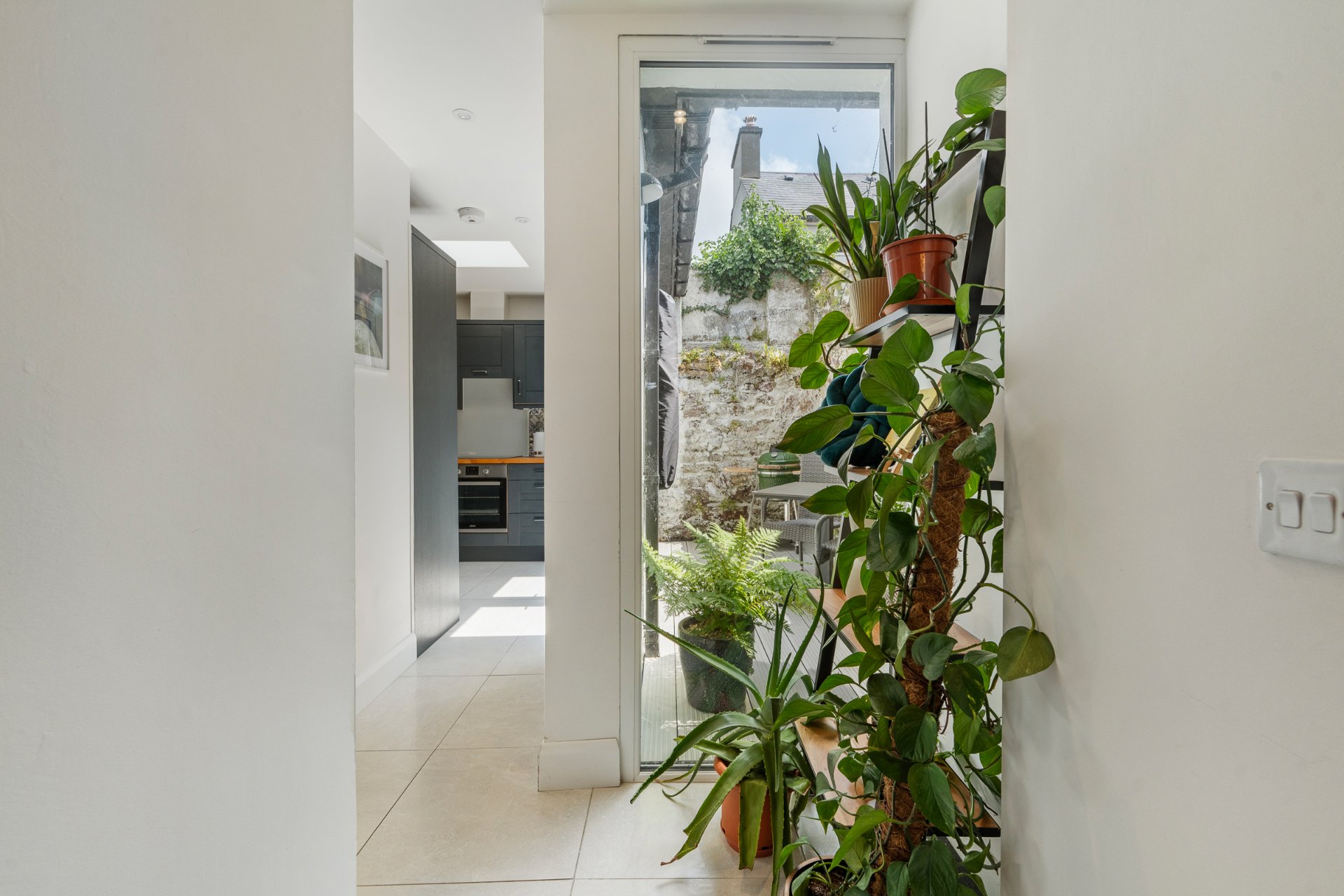The hall leading through to the kitchen and out to the rear courtyard.